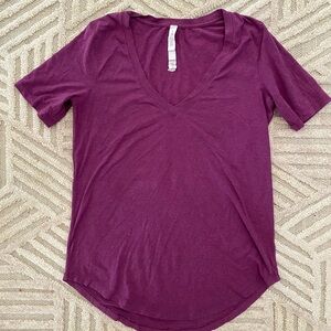 lululemon athletica Deep Rasberry V-Neck Tee.  Size 4.